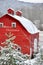 Merry christmas red barn in snow