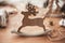 Merry Christmas. Rustic reindeer christmas toy on wooden table o