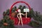 Merry Christmas sign held by manikin doll winter holiday scene