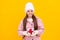 merry christmas. smiling cute kid in winter hat with box. teen girl in mittens