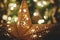 Merry Christmas! Stylish Christmas star close up on background of christmas golden lights bokeh. Atmospheric festive scandinavian