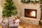 Merry Christmas! Stylish wrapped christmas gifts, christmas tree with festive lights and cozy burning fireplace. Atmospheric