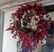 Merry Christmas Tartan  wreath made with rosehips for festive cheer