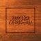 Merry Christmas typographic text on wood