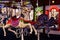 Merry-go-round, close-up plastic vintage horse in amusement park