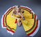 Merry Mexican dance performer posing with maracas