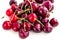 Merry. Red cherries, ripe berries on a white background.