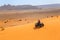Merzouga, Morocco - February 26, 2016: Man riding buggy in desert.