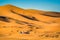 Merzouga, Morocco - October 12, 2013. Off road cars driving in dunes of Erg Chebbi