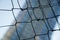 Mesh aluminium wire with defocused background, business concept