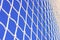 Mesh soccer outdoors. close-up. macro. football goal against the sky.