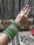 Mesmerising bridal bangles in bridal henna designed hand