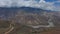 Mesmerizing drone view of a mountain range and a cloudy sky