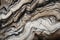 Mesmerizing Marble-Like Rock Texture with Swirling Stripes and Veins