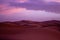 Mesmerizing scenery of the sand dunes of a desert at sunset
