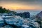 Mesmerizing shot of rugged rocks on highlands during the golden sunset