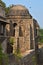 A mesmerizing view of hauz khas lake and garden from the hauz khas fort at hauz khas village at winter foggy morning