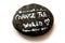 Message painted on a boulder that encourages the world to change