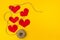 The message on the rope for mom from a small child. A lot of hearts on a yellow background