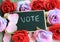 Message of vote with flowers in the background