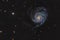 Messier 101 or Pinwheel galaxy in the constellation Ursa Major taken with CCD camera and medium focal length telescope