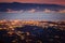 Messina strait and Reggio Calabria city lights at dusk