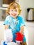 Messy, boy or flour to play, baking or fun holiday activity as meal prep, nutrition or portrait. Naughty, male child or