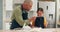 Messy, father and child baking with dough for playing, cooking or food for breakfast in a house. Happy, playful and a