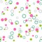 Messy green, pink dots and rings on white background. Colorful spring seamless pattern with round shapes.