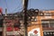 Messy tangle of electric and telephone wires on street pole. Shanghai, China