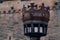 Metal ancient torch in crown shape at the entrance of Edinburgh Castle, Scotland. Scottish symbol