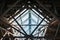 Metal beams and modern glass ceiling at airport.