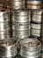 Metal Beer Kegs Stacked in a Vertical View