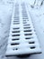 Metal bench with halls covered in snow