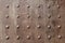 Metal board with round spikes pattern