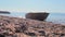 Metal boat on the shore of Lake Baikal.