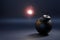 A metal bomb in the form of a cannonball with a burning fuse. Aggressive mood concept. Time bomb. Terrorism. 3d render