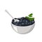 Metal bowl of black olives with spoon and parsley leaves
