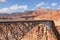 The metal bridge in abrupt coast of desert