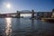 Metal bridge Falce creek and sunset in Vancouver. Travel places. Water reflection, clear sky blue.