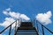 Metal Bridge or Stair to blue Sky and White Cloud