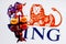 Metal bull stands on buy-sell dices on background of ING Group logo