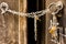 Metal chain closes an old door of an abandoned house