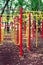 Metal children`s outdoor playground equipment bars swing yellow and red color