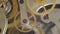 Metal cogwheels inside clockwork. Concept Eternity, Teamwork. Tick-Tick Sound