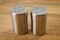 Metal containers with holes in the lids for salt and pepper, for serving the kitchen table