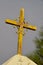 Metal Cross on Cemetery Entry