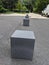 Metal cubes along a walkway