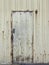 Metal door of a deteriorated industrial warehouse
