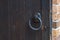 Metal door ring on wooden doors